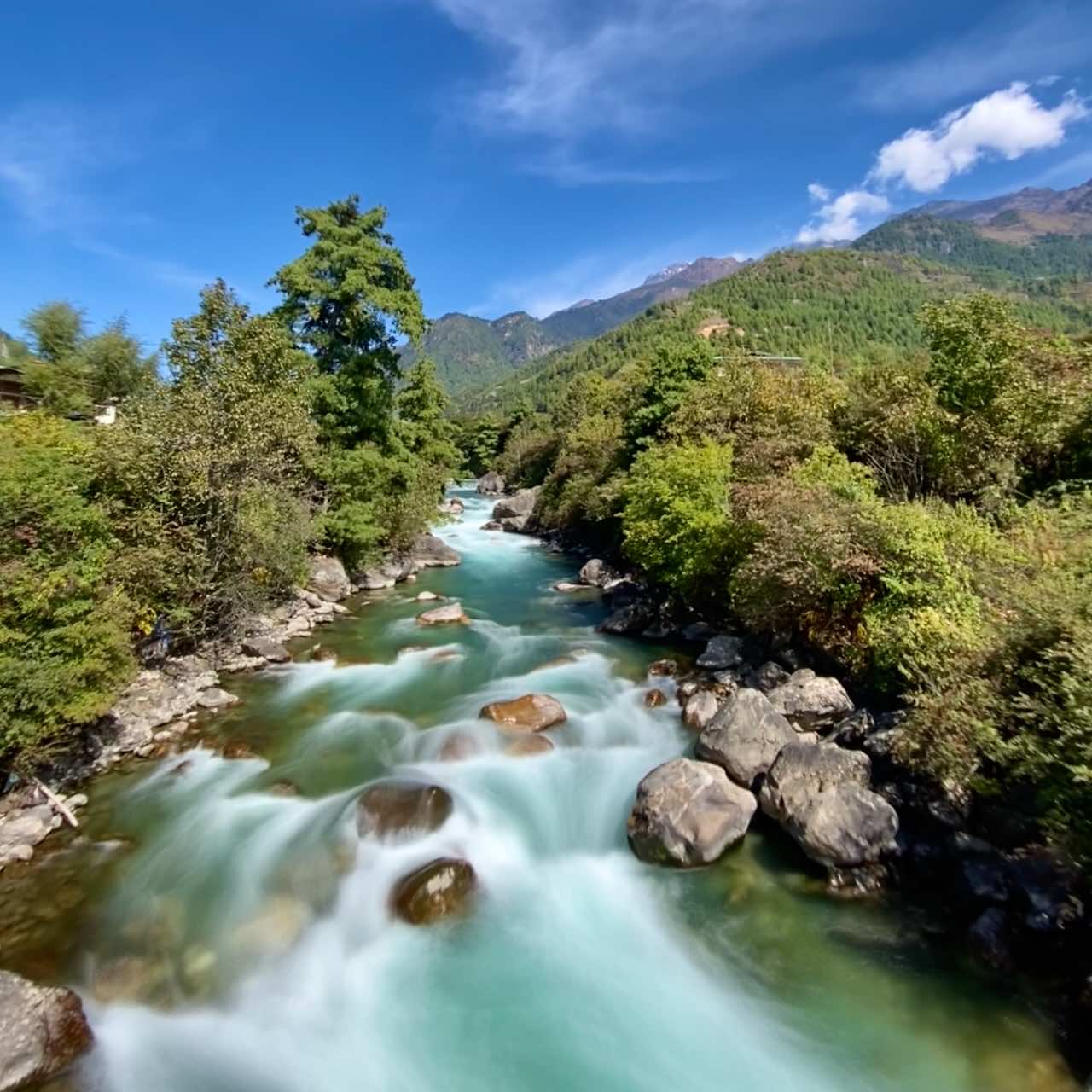 A long exposure river photo outside of Paro in Bhutan