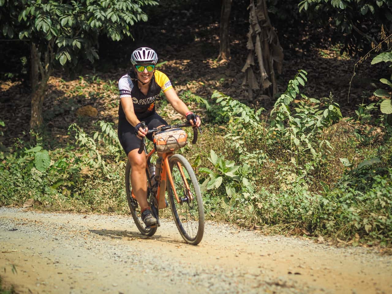 gravel cyclist on cycling organised tour in Thailand